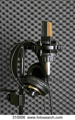 Microphone, stand and headphones View Large Photo Image Stock Photograph - Microphone, stand and headphones. Fotosearch