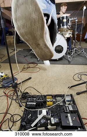 Stock Photo - Rock band performing. Fotosearch