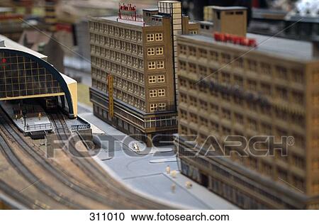 Stock Image - Model of buildings near train station. Fotosearch