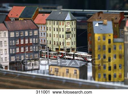Model of city intersection with cable cars and apartment buildings View Large Photo Image Stock Image - Model of city intersection with cable cars and apartment buildings. Fotosearch