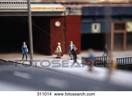 Model of commuters in front of train station View Large Photo Image Picture - Model of commuters in front of train station. Fotosearch