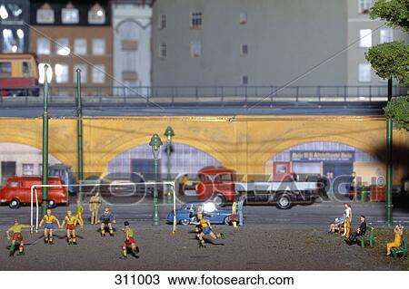 Model of soccer match near railway track View Large Photo Image Stock Image - Model of soccer match near railway track. Fotosearch