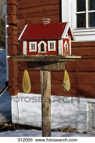 Stock Photography - Birdhouse in yard. Fotosearch