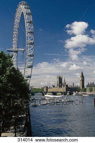Picture - Big Ben and the Houses of Parliament across the Thames river from the Millennium Wheel, London, England. Fotosearch