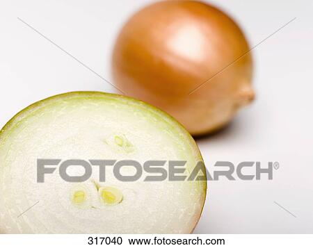Stock Image - Brown onions. Fotosearch