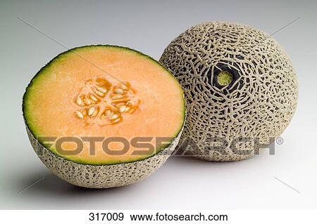 Stock Photo - Cantaloupe cut in half. Fotosearch