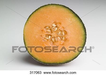 Cross section of cantaloupe View Large Photo Image Stock Image - Cross section of cantaloupe. Fotosearch