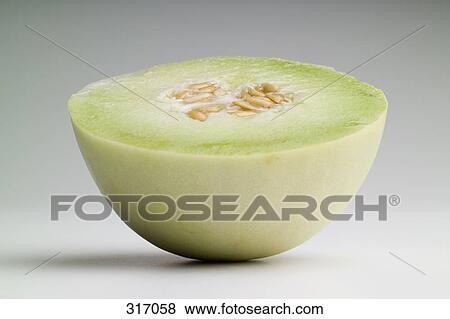 Cross section of honey dew melon View Large Photo Image Stock Photo - Cross section of honey dew melon. Fotosearch