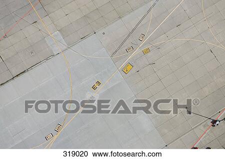 Aerial view of markings on airport tarmac View Large Photo Image Stock Image - Aerial view of markings on airport tarmac. Fotosearch