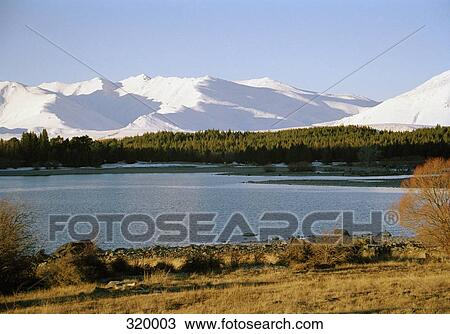 Mountains and lake, South Island, New Zealand View Large Photo Image Stock Image - Mountains and lake, South Island, New Zealand. Fotosearch