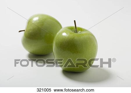 Two Granny Smith apples View Large Photo Image Stock Photography - Two Granny Smith apples. Fotosearch