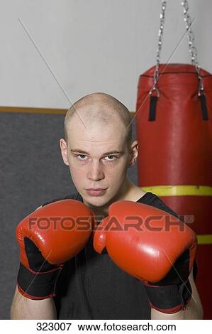 Male boxer in fighting stance View Large Photo Image Stock Photo - Male boxer in fighting stance. Fotosearch