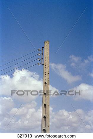 Telephone pole and power lines below clouds View Large Photo Image Stock Image - Telephone pole and power lines below clouds. Fotosearch