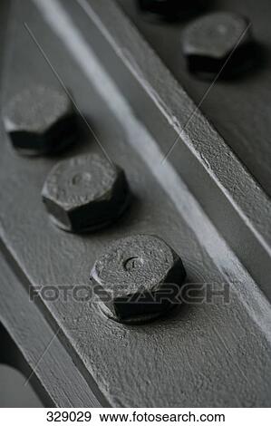 Bolts attached to panel View Large Photo Image Stock Photo - Bolts attached to panel. Fotosearch