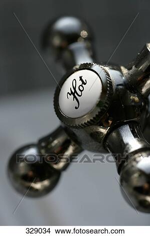 Picture - Hot water faucet. Fotosearch