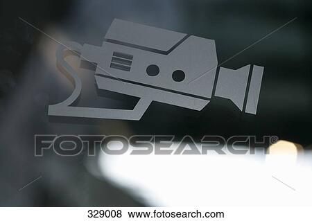 Stock Photo - Security camera icon on window. Fotosearch