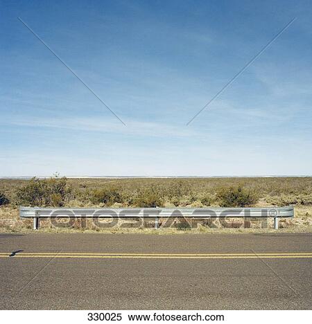 Landscape behind two lane highway View Large Photo Image Stock Photography - Landscape behind two lane highway. Fotosearch