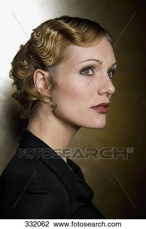 Woman wearing evening wear View Large Photo Image Stock Image - Woman wearing evening wear. Fotosearch