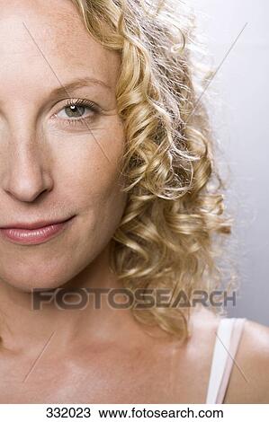 Woman with ringlets smiling View Large Photo Image Stock Image - Woman with ringlets smiling. Fotosearch
