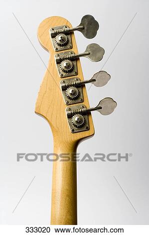 Head and neck of bass guitar View Large Photo Image Stock Image - Head and neck of bass guitar. Fotosearch