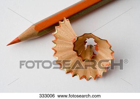 Red pencil and shavings View Large Photo Image Stock Photograph - Red pencil and shavings. Fotosearch