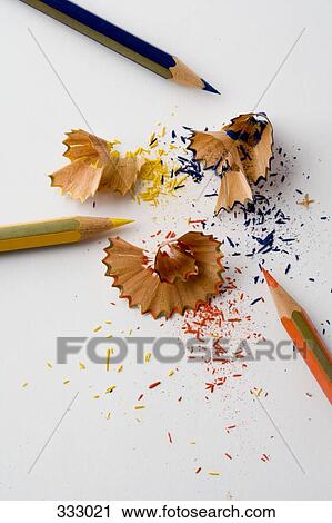 Three colored pencils and shavings View Large Photo Image Stock Image - Three colored pencils and shavings. Fotosearch