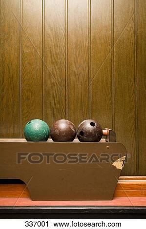 Three bowling balls in bowling alley View Large Photo Image Stock Image - Three bowling balls in bowling alley. Fotosearch