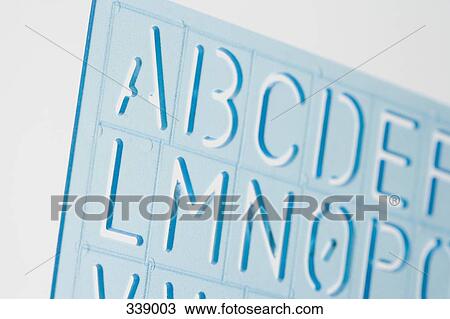 Stock Image - Close-up of a plastic stencil. Fotosearch
