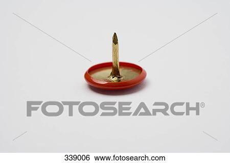 Stock Photograph - Single drawing pin. Fotosearch