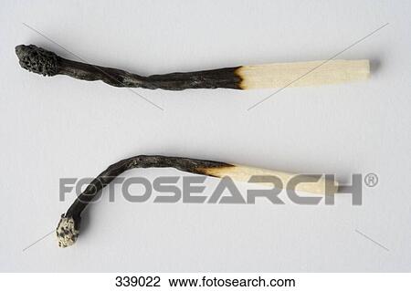 Stock Image - Two burnt matches. Fotosearch