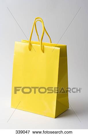 Stock Photo - Yellow gift bag. Fotosearch