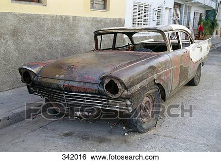 Abandoned old car in city street, Cuba View Large Photo Image Stock Photograph - Abandoned old car in city street, Cuba. Fotosearch