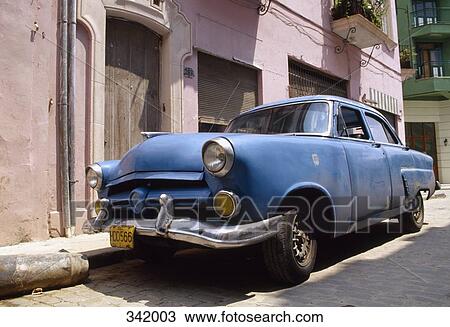 Old blue car parked in street, Havana, Cuba View Large Photo Image Stock Image - Old blue car parked in street, Havana, Cuba. Fotosearch