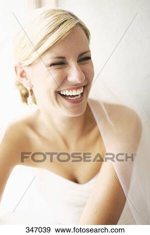 Portrait of a bride laughing View Large Photo Image Stock Photo - Portrait of a bride laughing. Fotosearch