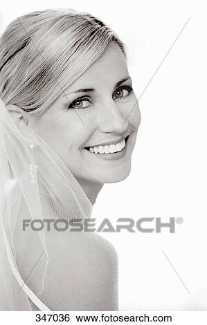 Stock Photograph - Portrait of a bride looking over her shoulder. Fotosearch