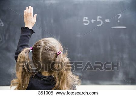 Girl in classroom with raised hand View Large Photo Image Stock Photography - Girl in classroom with raised hand. Fotosearch