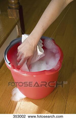 Bucket full of soap suds and hand washing View Large Photo Image Stock Image - Bucket full of soap suds and hand washing. Fotosearch