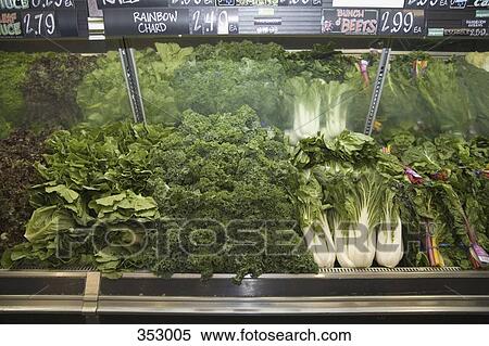 Cabbages and Lettuces on supermarket shelf View Large Photo Image Stock Photography - Cabbages and Lettuces on supermarket shelf. Fotosearch