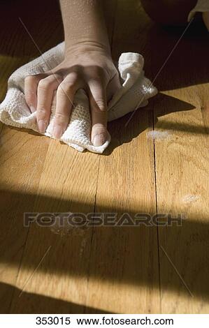 Hand cleaning wooden floor View Large Photo Image Stock Photography - Hand cleaning wooden floor. Fotosearch