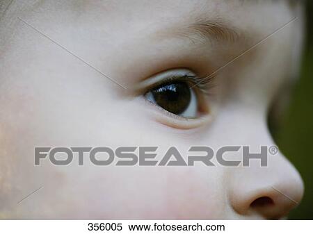 Stock Photography - Close up of the face of a child. Fotosearch