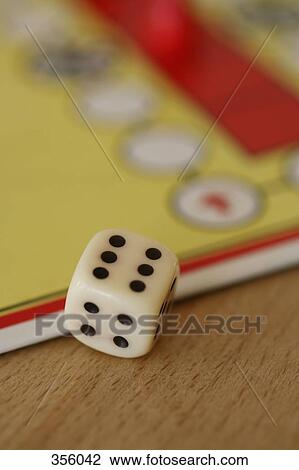Dice and board game View Large Photo Image Stock Image - Dice and board game. Fotosearch