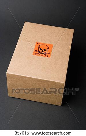 Stock Photography - Cardboard box with toxic label. Fotosearch