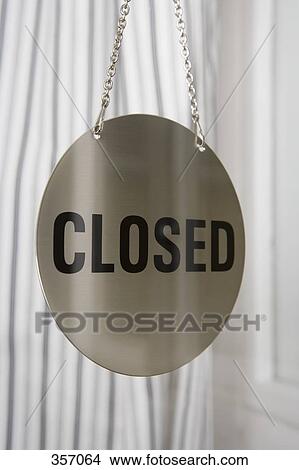 ‘Closed’ sign in window View Large Photo Image Picture - ‘Closed’ sign in window. Fotosearch