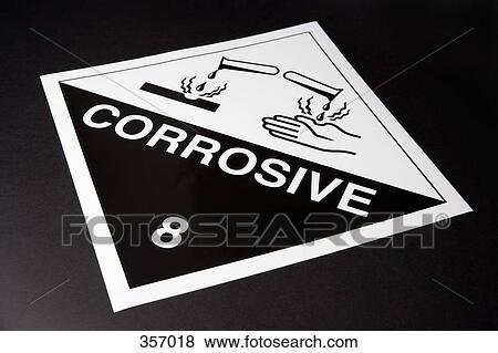 Stock Photo - ‘Corrosive’ warning sign. Fotosearch