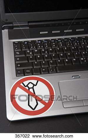 ‘No shirt and tie’ sticker on laptop View Large Photo Image Stock Image - ‘No shirt and tie’ sticker on laptop. Fotosearch