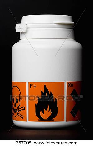 Stock Photography - White bottle with various warning labels. Fotosearch
