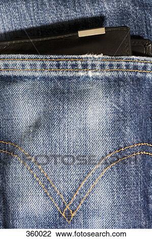 Leather wallet poking out of jeans pocket View Large Photo Image Stock Image - Leather wallet poking out of jeans pocket. Fotosearch