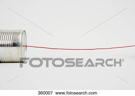 Red string attached to tin can View Large Photo Image Stock Photo - Red string attached to tin can. Fotosearch