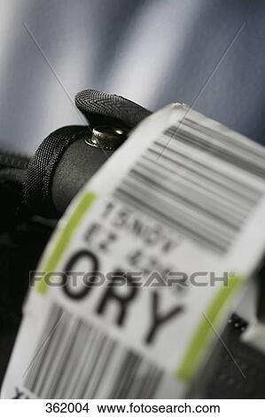 Luggage tag on suitcase View Large Photo Image Picture - Luggage tag on suitcase. Fotosearch