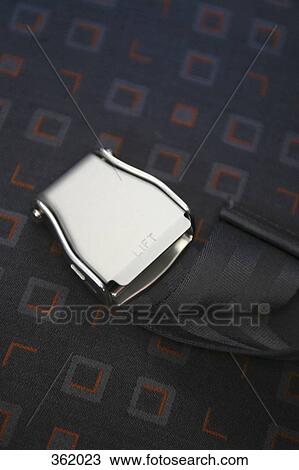 Safety belt on seat in airplane View Large Photo Image Stock Image - Safety belt on seat in airplane. Fotosearch